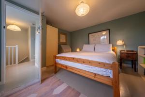 Un pat sau paturi într-o cameră la 4 Gravel Hill