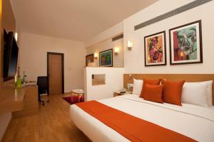 Voodi või voodid majutusasutuse Lemon Tree Hotel, Udyog Vihar, Gurugram toas