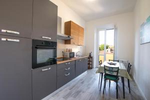 Η κουζίνα ή μικρή κουζίνα στο Piombino Apartments - Casa Collodi