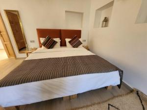 Katil atau katil-katil dalam bilik di AdaZen Ecolodge