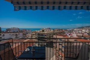 a view of a city from a balcony at ElBarrioCasablanca in Nerja