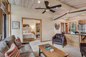 a living room with a couch and a ceiling fan at Laurelwood Condominiums 412 in Snowmass Village