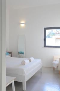 A bed or beds in a room at Agriturismo Casebianche