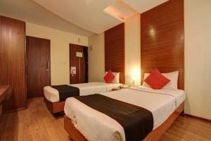 Katil atau katil-katil dalam bilik di Collection O Salasar Palace