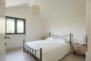 Postelja oz. postelje v sobi nastanitve Villa Orizzonti