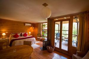 Ένα ή περισσότερα κρεβάτια σε δωμάτιο στο Haiku Cabañas Panorámicas +85 φωτογραφίες