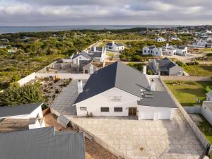 an aerial view of a white house at The Gallery in Franskraal