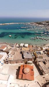an aerial view of a harbor with boats in the water at Casa Maricla - Marea Collection in Otranto