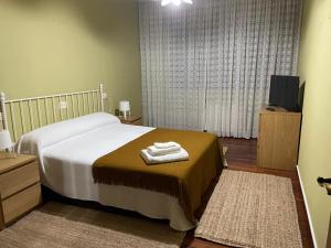 Posteľ alebo postele v izbe v ubytovaní LA CASA BLANCA