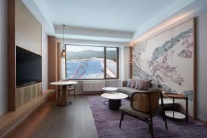 a hotel room with a view of a ski slope at Courtyard by Marriott Chongli in Zhangjiakou