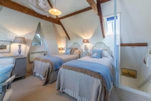 Voodi või voodid majutusasutuse Piper Cottage toas