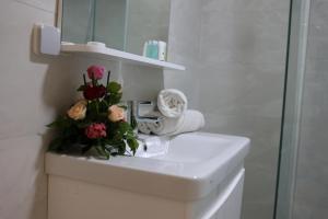 Koupelna v ubytování Hôtel Des Lilas