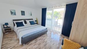 Posteľ alebo postele v izbe v ubytovaní Apartmani Mirko Rovinj