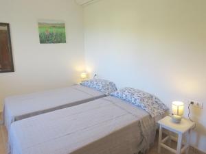 Postel nebo postele na pokoji v ubytování Maison avec logement indépendant piscine privée et vue mer + 29 fotografií