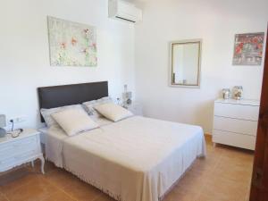 Postel nebo postele na pokoji v ubytování Maison avec logement indépendant piscine privée et vue mer