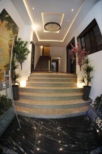 Fotografie z fotogalerie ubytování Hôtel Des Lilas v destinaci Udžda