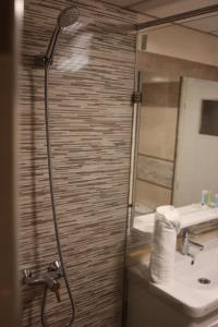 Koupelna v ubytování Hôtel Des Lilas