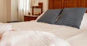 Postel nebo postele na pokoji v ubytování Casa Quebraero Caminito del Rey