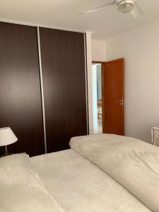 Un pat sau paturi într-o cameră la Torre Mitre