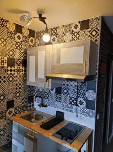 Kuchyň nebo kuchyňský kout v ubytování Saltillo Alto Boutique Studio