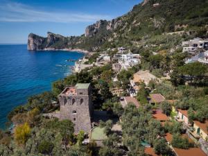 an aerial view of positano on the amalfi coast at Torre Turbolo Apartments in Massa Lubrense