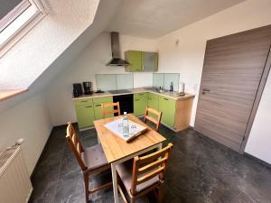 Kuchyň nebo kuchyňský kout v ubytování Ferienwohnung Harzdomizil