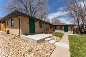 a house with a bench in front of it at Hidden Gem of Arvada! in Arvada