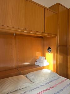Кровать или кровати в номере Malvezzi 36