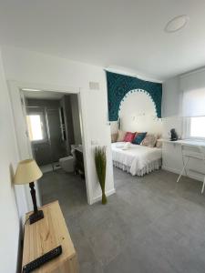 Postel nebo postele na pokoji v ubytování Levante by Mintaka Homes