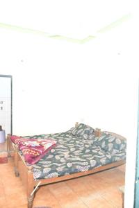Łóżko lub łóżka w pokoju w obiekcie SPOT ON Hotel Durga