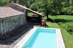 Bazén v ubytování Casa Cocola nebo v jeho okolí