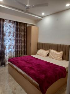 Lova arba lovos apgyvendinimo įstaigoje Flagship Hotel Karan Paradise