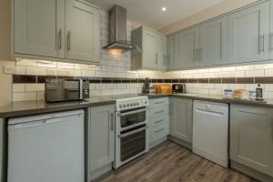 Köök või kööginurk majutusasutuses Seaside Cottage