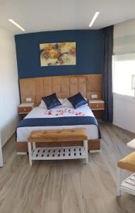 Voodi või voodid majutusasutuse HOSTAL MH BORJ toas