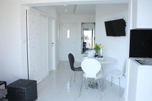Televisyen dan/atau pusat hiburan di Apartment One Vision