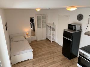 Kuchyň nebo kuchyňský kout v ubytování Frundsberg-Apartment