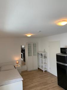 Postel nebo postele na pokoji v ubytování Frundsberg-Apartment