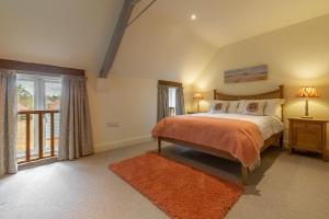 Voodi või voodid majutusasutuse The Big Barn toas