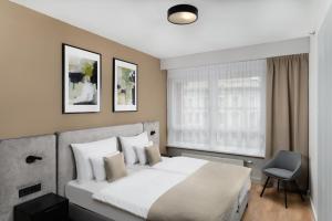 Postel nebo postele na pokoji v ubytování Florin Apart Hotel + 37 fotografií