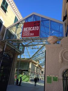 a sign that reads mercato brasil sarajevo outside a building at Apartament Design & Comfort in centro in Genoa