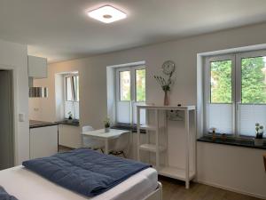 Postel nebo postele na pokoji v ubytování Frundsberg-Apartment