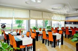 Restauracja lub miejsce do jedzenia w obiekcie Rezydencja Lux