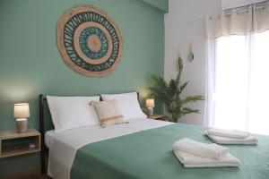Postel nebo postele na pokoji v ubytování Sitia Cozy Apartment