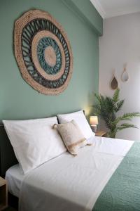 Postel nebo postele na pokoji v ubytování Sitia Cozy Apartment