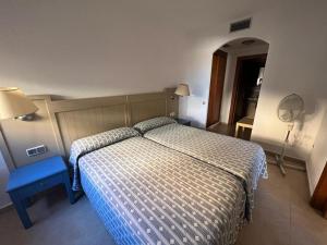 A bed or beds in a room at Jardines de isla canela (Punta del moral)
