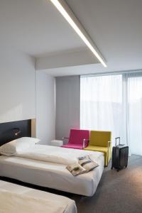 Postel nebo postele na pokoji v ubytování Hotel Privo + 37 fotografií