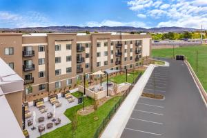 an aerial view of an apartment building with a parking lot at WaterWalk Extended Stay by Wyndham Boise Meridian in Meridian