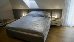 Ένα ή περισσότερα κρεβάτια σε δωμάτιο στο Agroturystyka Ostrowie