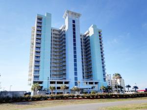 two tall buildings in front of a beach at Emerald Dolphin #1610 in Pensacola Beach