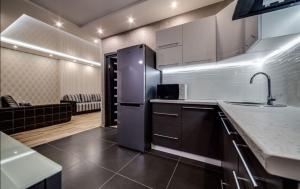 Virtuvė arba virtuvėlė apgyvendinimo įstaigoje Comfortable Apartments